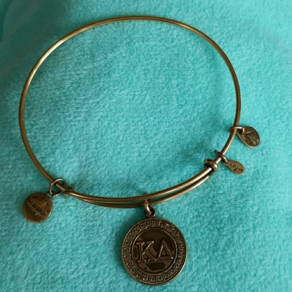 Alex and Ani Jewelry - Gold Alex and Ani BANGLE charm 2012 bracelet Alex and Ani Jewelry - Gold Alex and Ani BANGLE charm 2012 bracelet